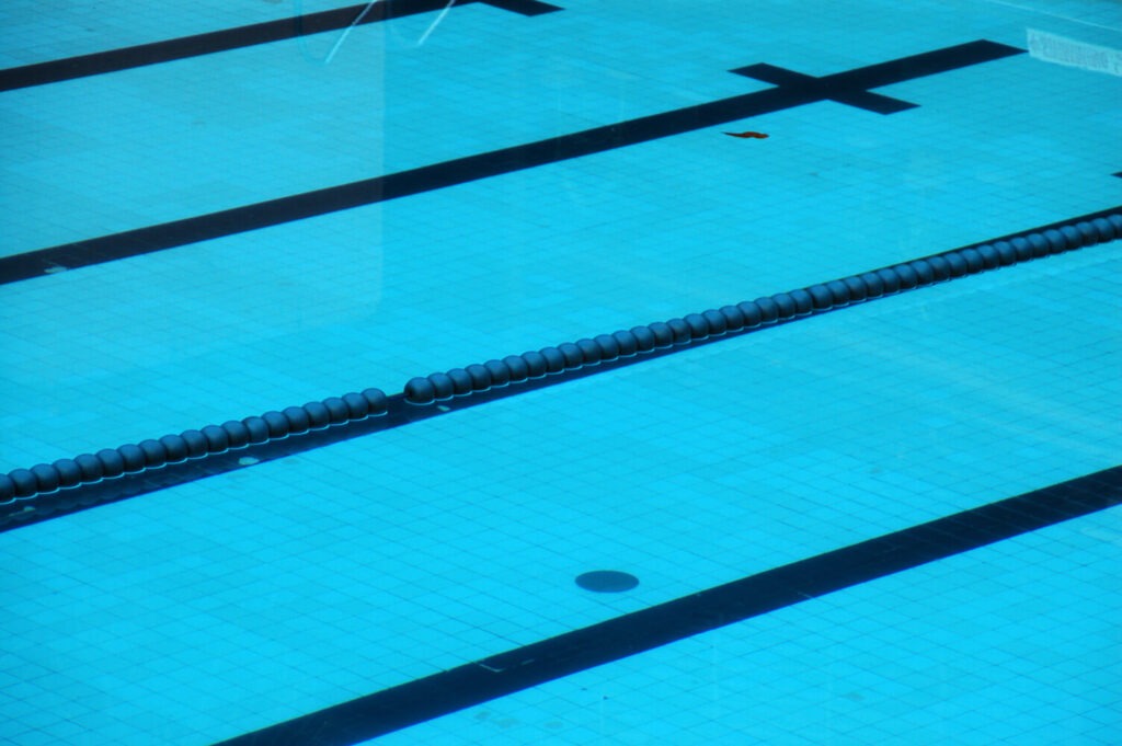 swimming pool with blue looking water